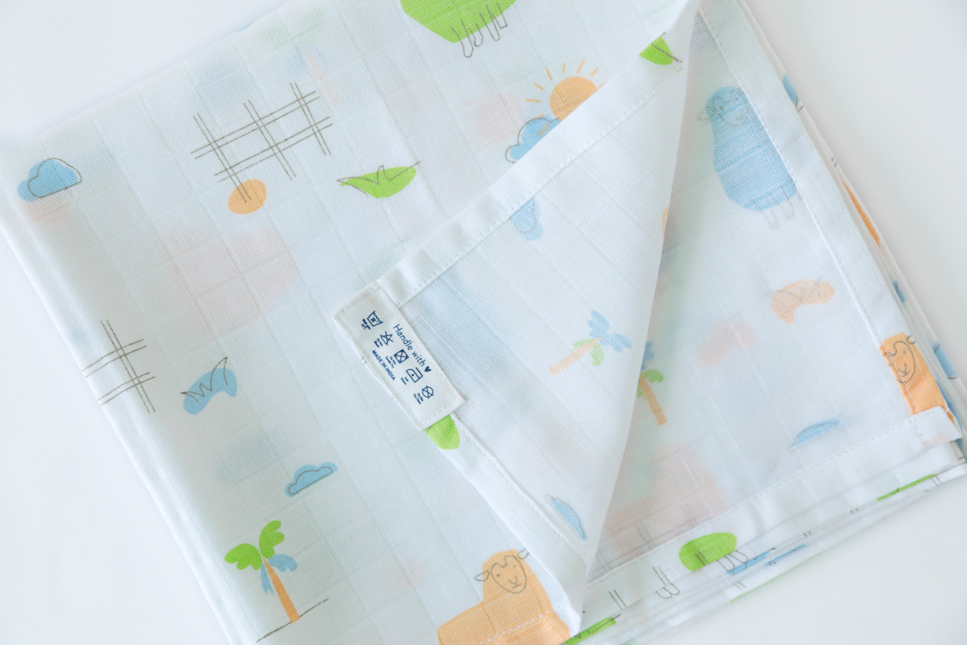 Woolly Wonderland - Organic Cotton (double layer) Baby Muslin Swaddle - 110 X 110 cms